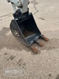 Used Bucket in yard,Back of used Bucket,Side of used Werk Brau Bucket,Front of used bucket